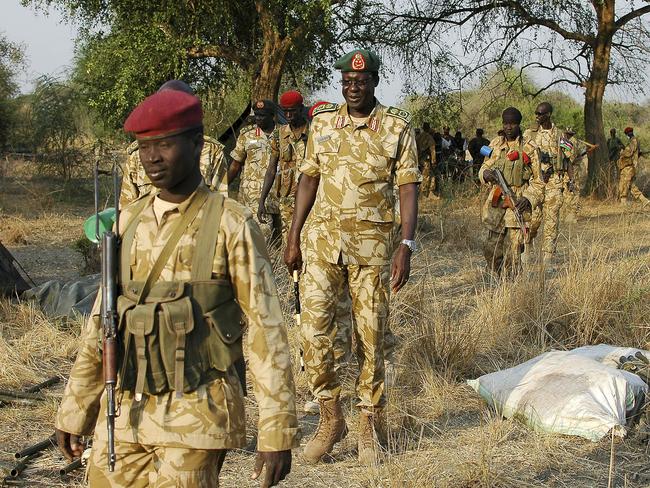 General James Hoth Mai (third from left) in South Sudan in early 2014. Picture: AFP/ Charles Lomodong