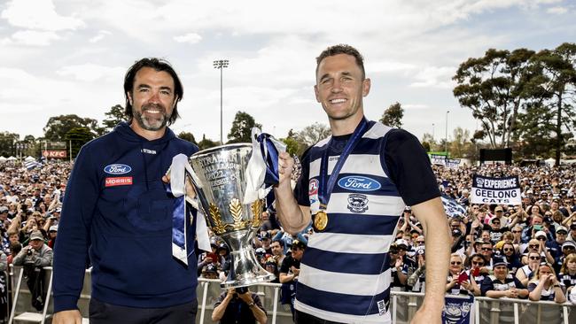 Chris Scott and Joel Selwood show off the Premiership cup in front of Geelong fans. Photo by Sam Tabone/Getty Images.