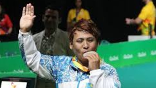 Powerlifter Raushan Koishibayeva of Kazakhstan celebrates her silver medal at the Rio Paralympics.