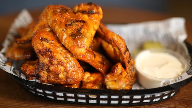 The Guilded Rose also serves spicy chicken wings and other American favourites. Picture: Stuart Milligan