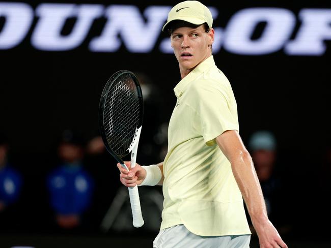 Italy's Jannik Sinner reacts to a point against Germany's Alexander Zverev during their men's singles final match on day fifteen of the Australian Open tennis tournament in Melbourne on January 26, 2025. (Photo by Martin KEEP / AFP) / -- IMAGE RESTRICTED TO EDITORIAL USE - STRICTLY NO COMMERCIAL USE --