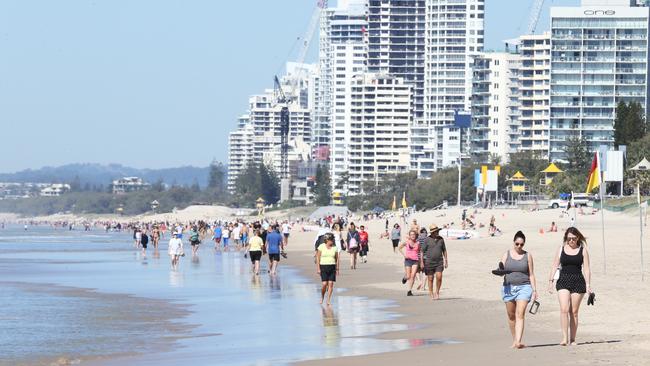 Beachgoers flock to Surfers Paradise. Picture: Glenn Hampson