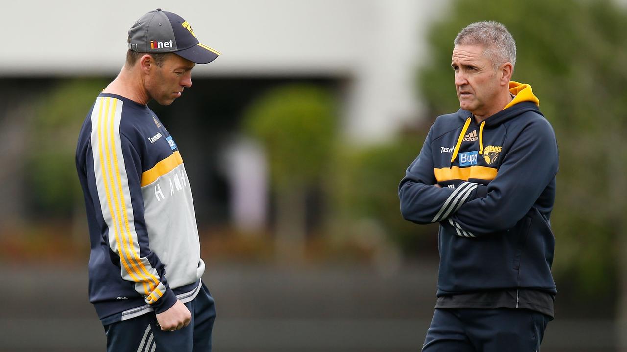 Alastair Clarkson, Senior Coach of the Hawks (left) and Chris Fagan, Football Manager of the Hawks share a discussion during the Hawthorn Hawks training session at the Ricoh Centre, Melbourne on September 17, 2015. (Photo: Michael Willson/AFL Media)