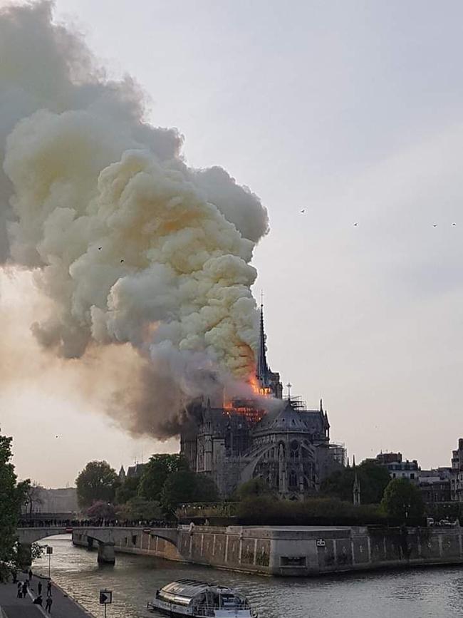 Hundreds of people lined the banks of the Seine to watch the inferno. Picture: Twitter.