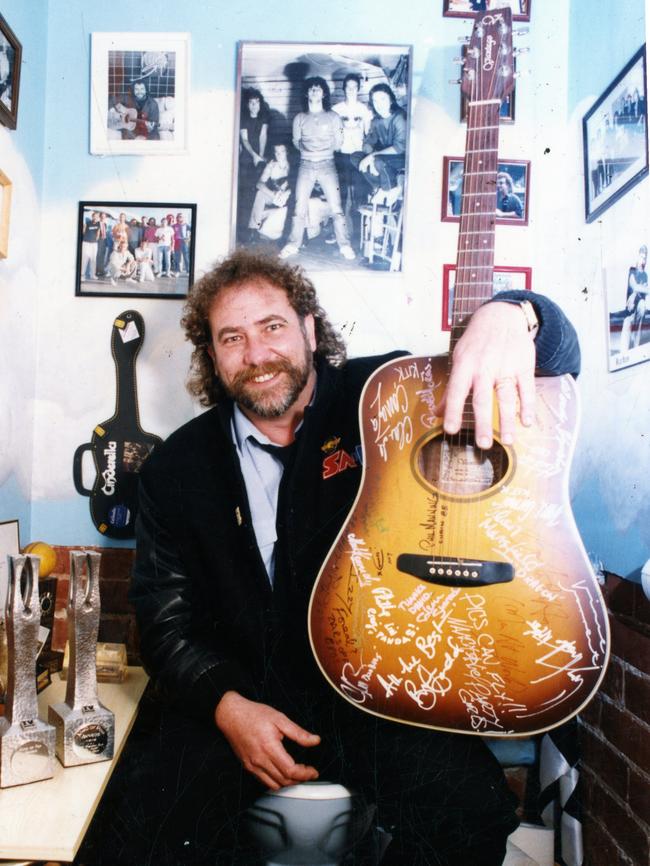 SAFM radio announcer David Day at home in the bathroom with his celebrity memorabilia and awards in 1993.