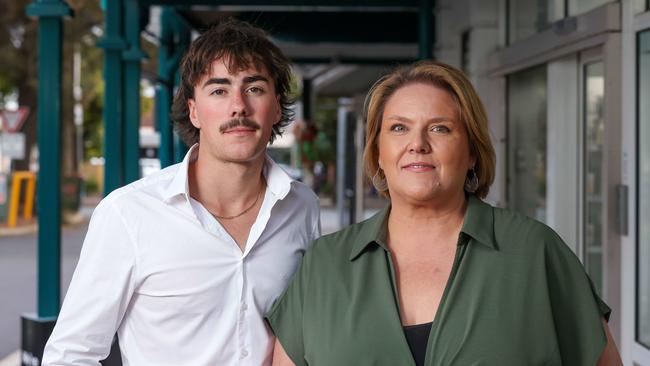 Melanie Browning with son Mitchell outside National Pharmacies at Norwood – one of several 24/7 chemists in Adelaide. Picture: Russell Millard