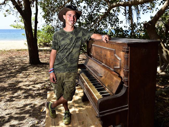 Hayden Clarke used his ute to transport a piano to Radical Bay on Magnetic Island, after a piano at the site was previously burnt down. PICTURE: MATT TAYLOR.