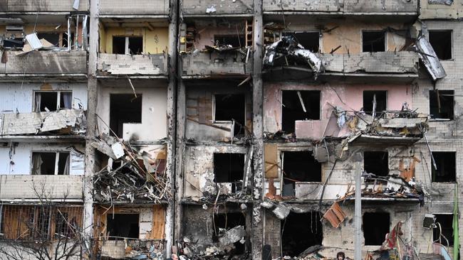 A damaged residential building at Koshytsa Street, a suburb of the Ukrainian capital Kyiv, where a military shell allegedly hit, on February 25, 2022. Picture: Daniel Leal / AFP