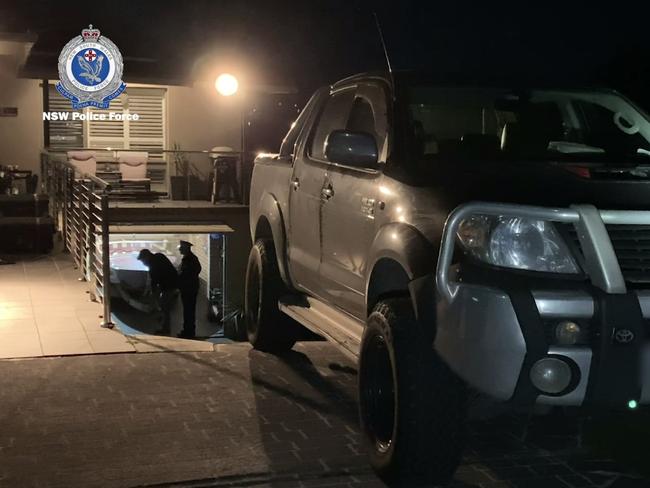 Police say they found 107kg of methylamphetamine in the rear tray of a Toyota Hilux parked in the driveway. Picture: NSW Police