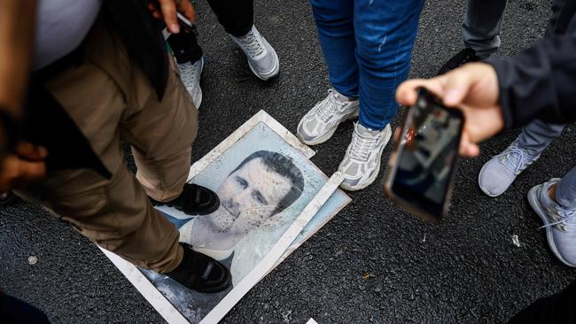 Demonstrators outside the Syrian Consulate in Istanbul on Sunday. Picture: Kemal Aslan/AFP