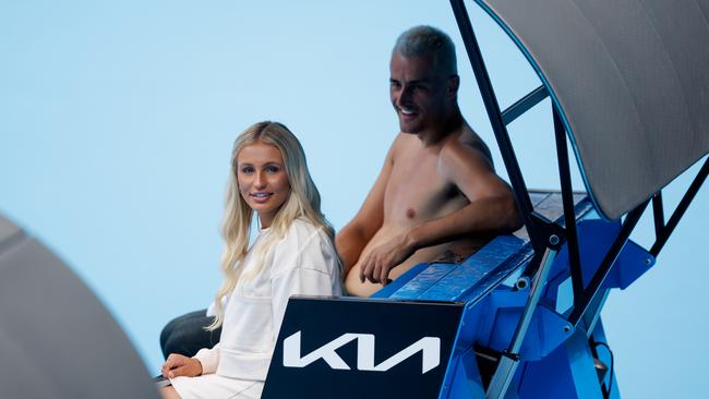 Bernard Tomic sits with Keely Hannah, who watched courtside as he practised at Melbourne Park on Friday, January 7, 2022. Picture: Mark Peterson, Tennis Australia