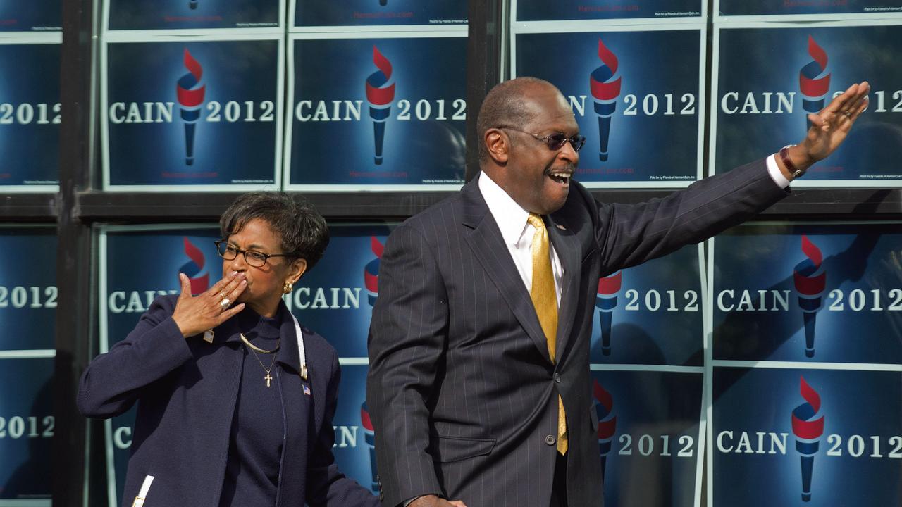 Gloria Cain blows a kiss to the crowd as she arrives with her husband Herman Cain at an event in Atlanta in 2011.