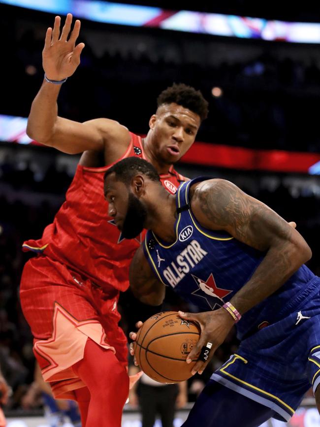 Giannis Antetokounmpo defends LeBron James in last season's All-Star game. (Photo by Jonathan Daniel/Getty Images)