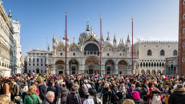 Tourist crowds in St Mark's Square, Venice.