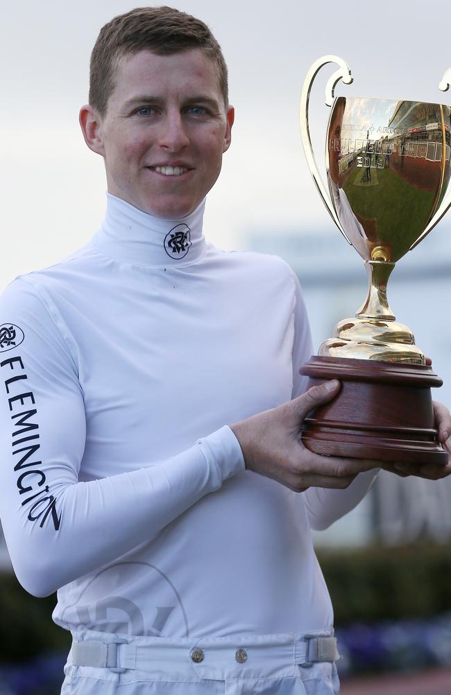 Lane with the Caulfield Cup trophy. Picture: Micheal Klein