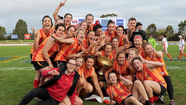 Morphettville Park players celebrate after winning the SA Women’s Football League grand final on Sunday – the club’s third premiership in a row. Picture: Greg Higgs.