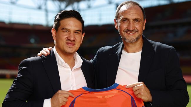 BRISBANE, AUSTRALIA - MAY 07: Roar head coach, Michael Valkanis (R) poses with Roar CEO Kaz Patafta during a Brisbane Roar A-League media opportunity at Suncorp Stadium on May 07, 2025 in Brisbane, Australia. (Photo by Chris Hyde/Getty Images)