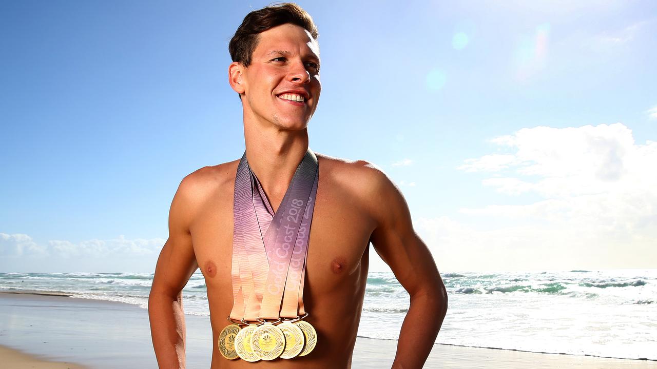 Mitch Larkin with the five gold medals he won at the Commonwealth Games. Pics Adam Head