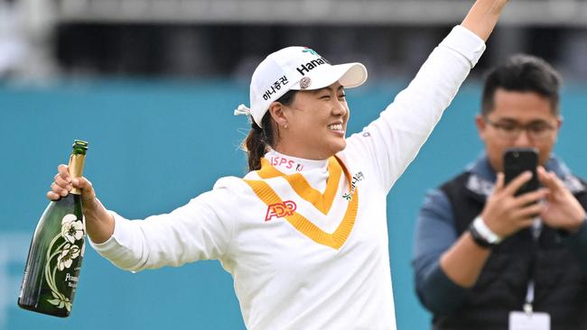 Australia's Minjee Lee celebrates her victory at the BMW Ladies Championship. Picture: Jung Yeon-je / AFP