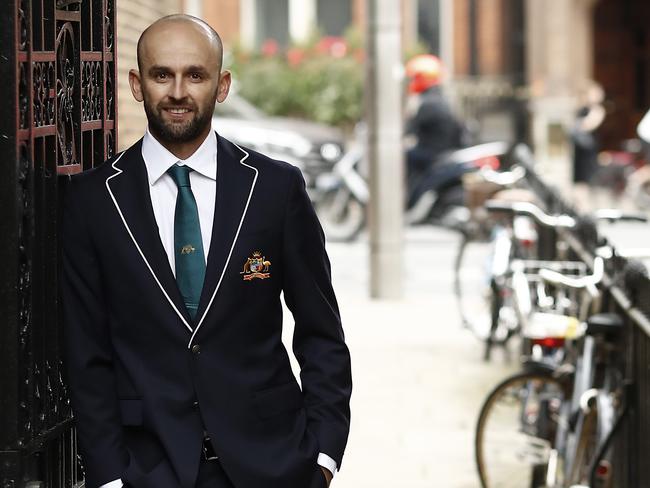 LONDON, ENGLAND - AUGUST 12: Nathan Lyon of Australia poses in his  team suit before a visit to the Australian High Commission at Australia House on August 12, 2019 in London, England. (Photo by Ryan Pierse/Getty Images)