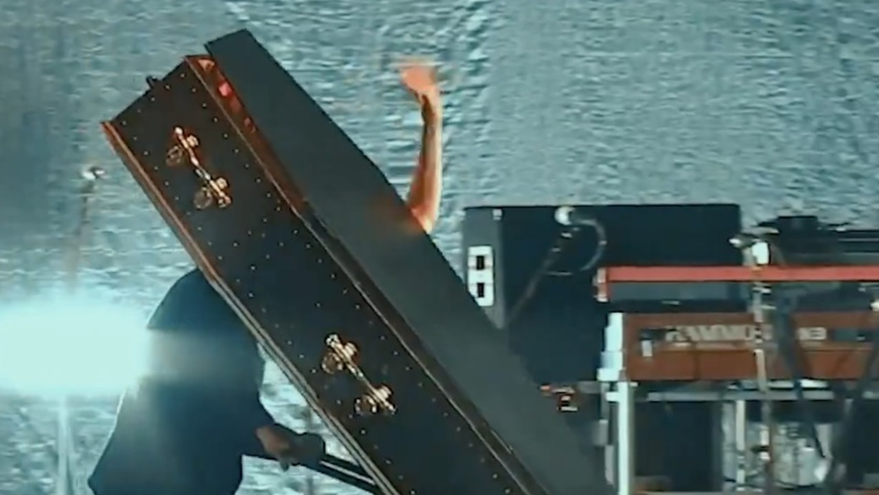 Rock legend shocks with bizarre on-stage act
