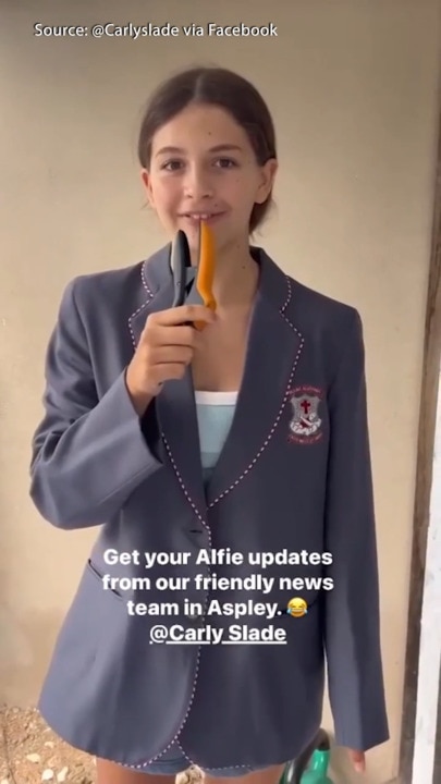 Brisbane family makes their own cyclone weather report at home