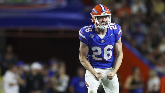 GAINESVILLE, FLORIDA - OCTOBER 05: Jeremy Crawshaw #26 of the Florida Gators reacts to a punt during the first half of a game against the UCF Knights at Ben Hill Griffin Stadium on October 05, 2024 in Gainesville, Florida. (Photo by James Gilbert/Getty Images)