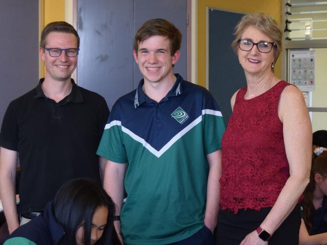 PHOTO: Title: Daniel in class with maths teacher Terry Grimberg and Principal, Denise Kostowski.