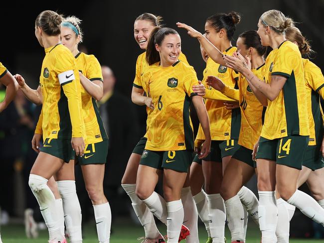 SYDNEY, AUSTRALIA - JUNE 03:  Clare Wheeler of Australia celebrates with team mates after scoring a goal during the international friendly match between Australia Matildas and China PR at Accor Stadium on June 03, 2024 in Sydney, Australia. (Photo by Matt King/Getty Images)