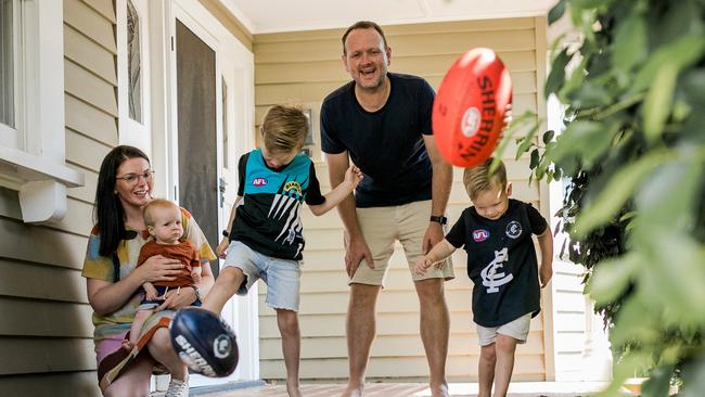 Geelong based Carlton AFLW coach Matt Buck and wife Rachael, a school principal, started foster caring before they had their boys. Picture: Supplied