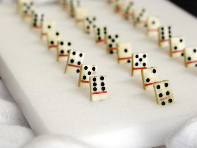 A miniature domino set made from whale bone.