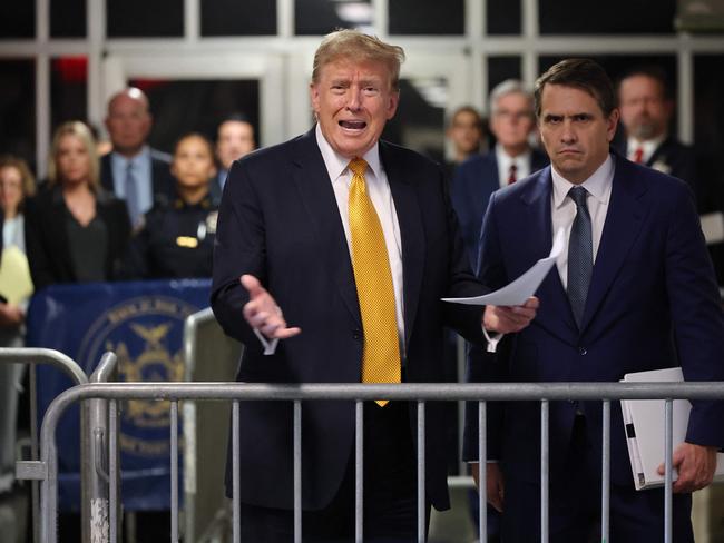 Donald Trump speaks to the press outside Manhattan Criminal Court. Picture: AFP