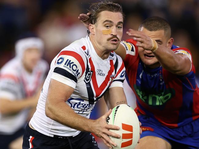 NEWCASTLE, AUSTRALIA - APRIL 11: Connor Watson of the Roosters runs the ball during the round six NRL match between Newcastle Knights and Sydney Roosters at McDonald Jones Stadium, on April 11, 2024, in Newcastle, Australia. (Photo by Cameron Spencer/Getty Images)