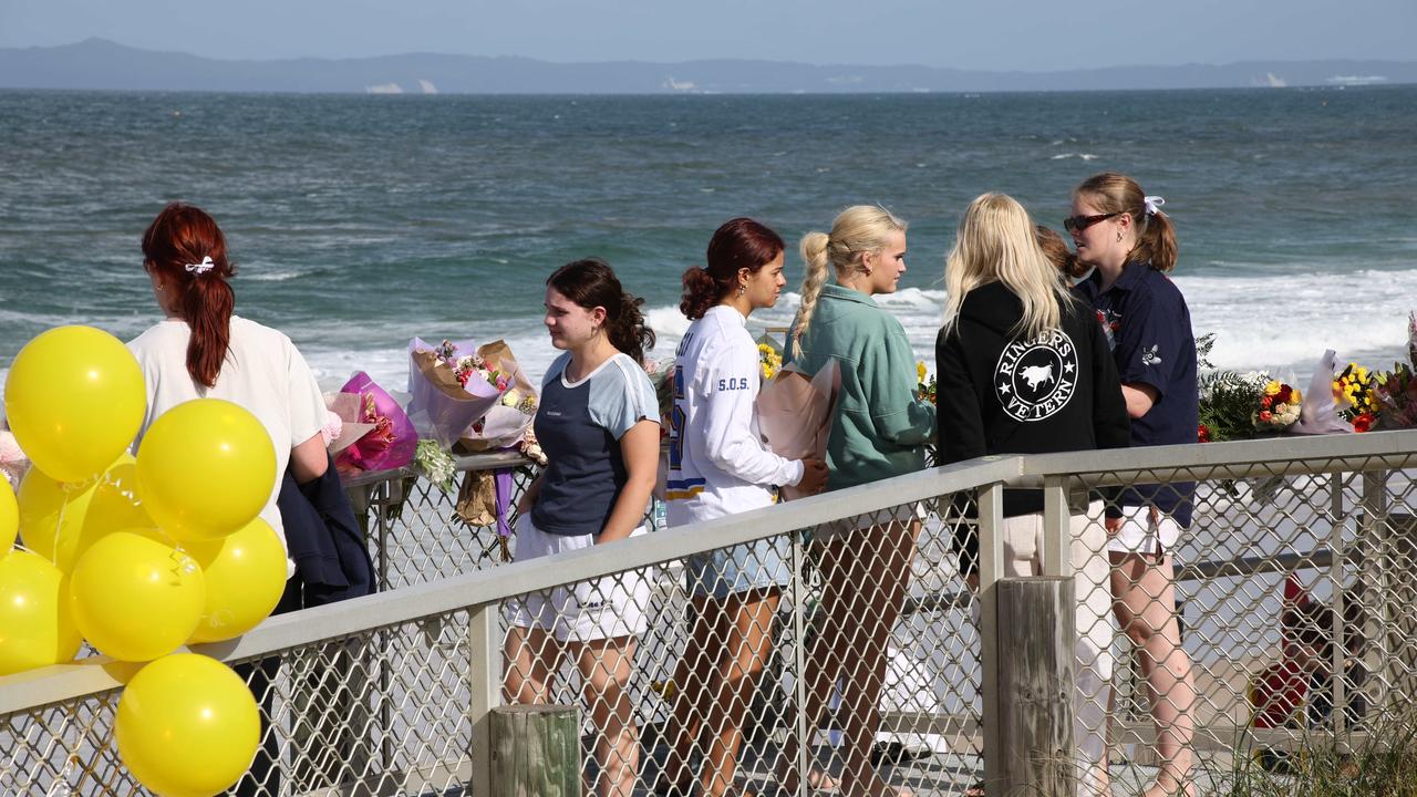 Hundreds of people have gathered at Bribie Island for a vigil to honour 17-year-old shark attack victim Charlize Zmuda. Picture: David Clark