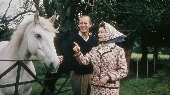 The royal pair visit a farm on the Balmoral estate in Scotland, during their Silver Wedding anniversary year in 1972. Picture: Fox Photos/Hulton Archive/Getty Images