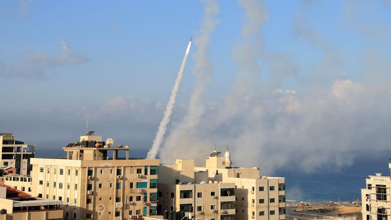 Rockets are fired from Gaza City towards Israel on October 7. Picture: Mahmud Hams / AFP