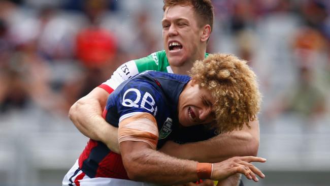 AUCKLAND, NEW ZEALAND - FEBRUARY 06: Eloni Vunakece of the Sydney Roosters is tackled during the 2016 Auckland Nines match between the Sydney Roosters and South Sydney at Eden Park on February 6, 2016 in Auckland, New Zealand. (Photo by Phil Walter/Getty Images)