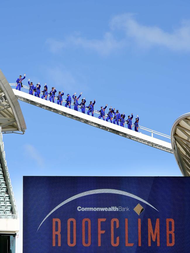 The first group makes their way up to the Oval roof. Picture: Roy VanDerVegt