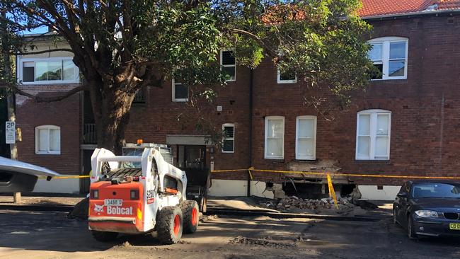 A Bobcat was brought in to clear some of the rubble