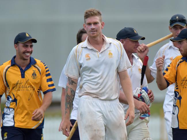 Maroochydore Blue against Gympie cricket grand final. Gympie celebrate the win Josh Brady (centre) walks off with his team. Photo: Warren Lynam / Sunshine Coast Daily