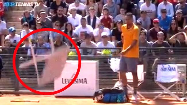 Nick Kyrgios throws a chair (circled) onto the court during his Italian Open meltdown.