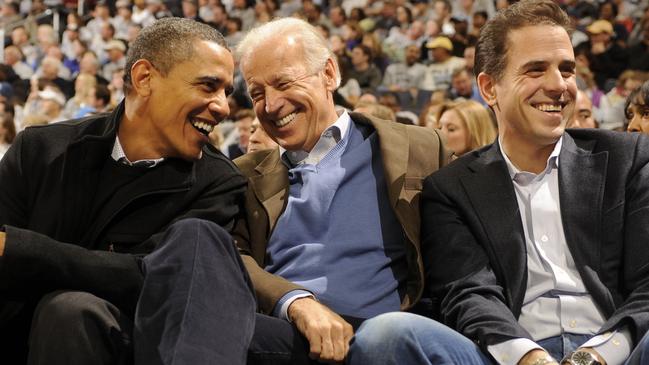 Joe and Hunter Biden with then president Barack Obama during a college basketball game in 2010. Picture: Getty Images.