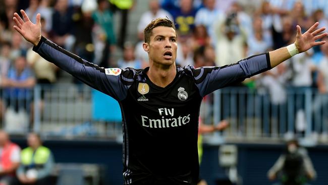 Real Madrid's Portuguese forward Cristiano Ronaldo celebrates after scoring.