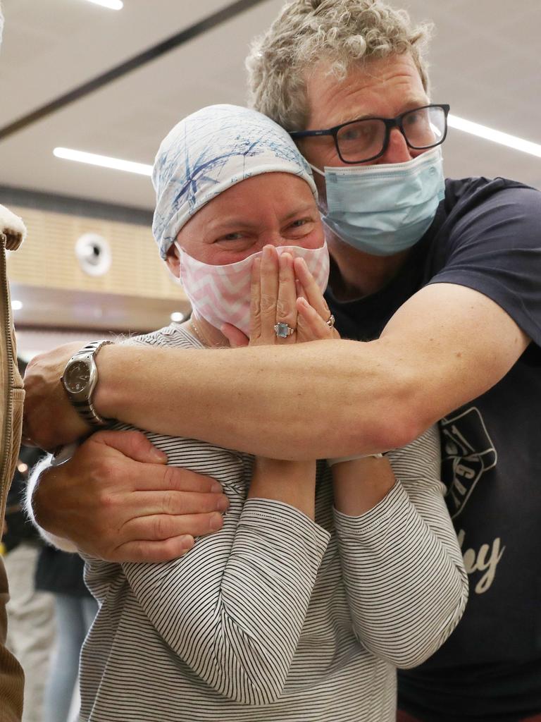 Kate Robertson who has been diagnosed with terminal cancer with son Noah and partner Nic Robertson waiting to meet her parents and two sisters who were arriving from the United Kingdom to see each other after 3 1/2 years. Picture: Nikki Davis-Jones