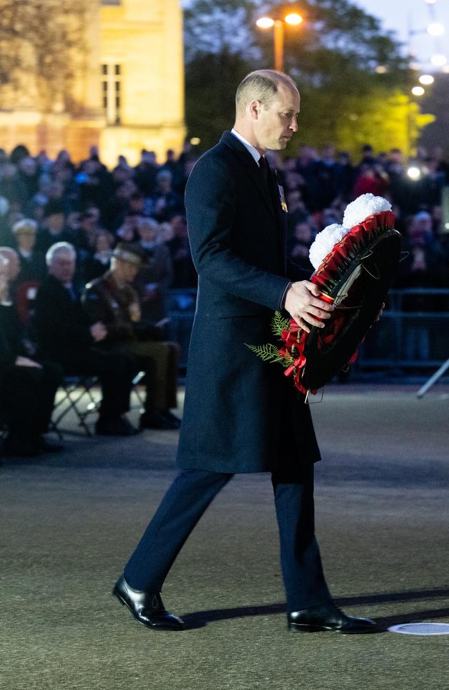 Prince William walking with the wreath. Picture: WireImage