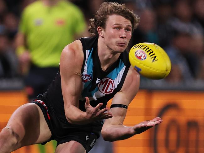 ADELAIDE, AUSTRALIA - SEPTEMBER 16: Xavier Duursma of the Power marks the ball during the 2023 AFL Second Semi Final match between the Port Adelaide Power and the GWS GIANTS at Adelaide Oval on September 16, 2023 in Adelaide, Australia. (Photo by James Elsby/AFL Photos via Getty Images)