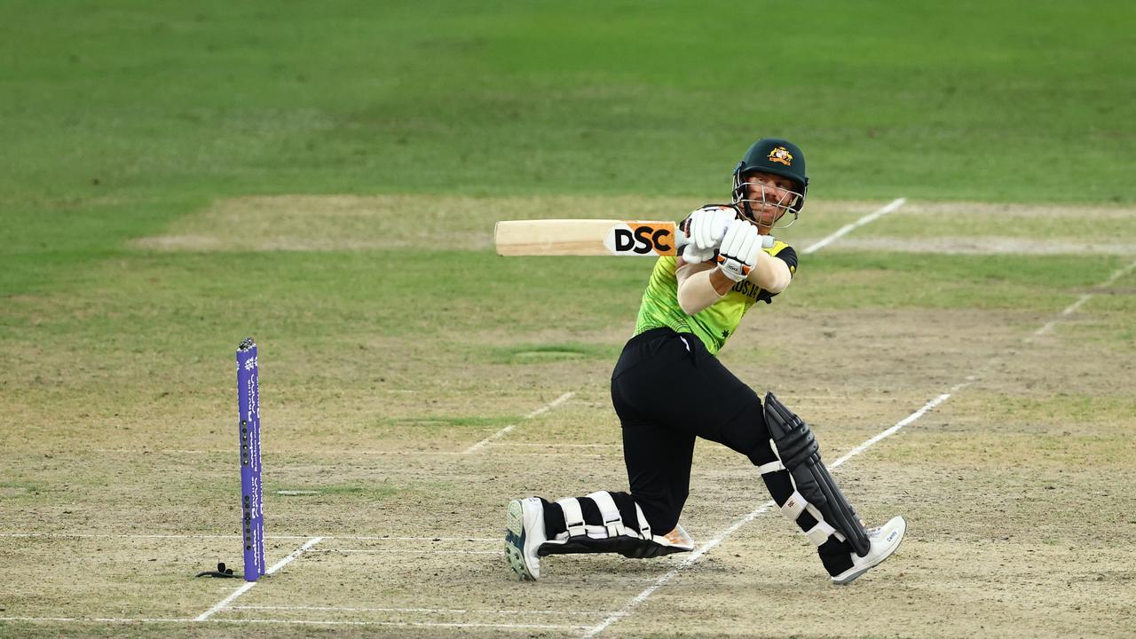 DUBAI, UNITED ARAB EMIRATES - NOVEMBER 11: David Warner of Australia plays a shot during the ICC Men's T20 World Cup semi-final match between Pakistan and Australia at Dubai International Stadium on November 11, 2021 in Dubai, United Arab Emirates. (Photo by Francois Nel/Getty Images)