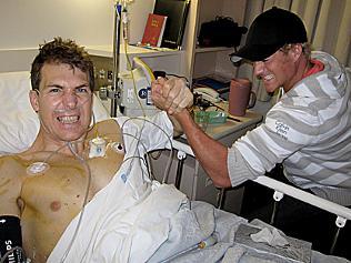 Jules Lund with his great mate Jim Stynes. Jules has produced a documentary on Stynes cancer battle which will air on the Nine Network.