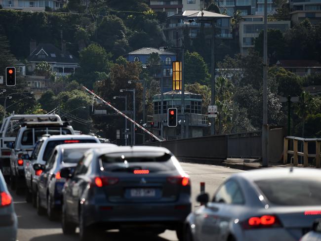 Traffic waits for the spit bridge to go up.