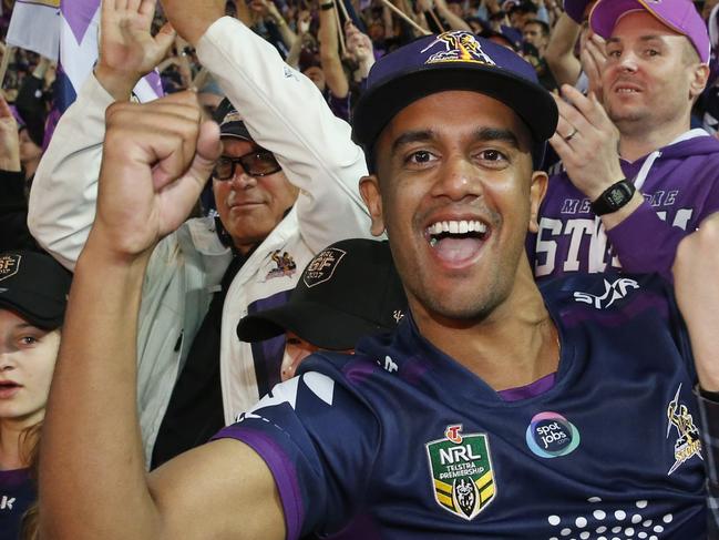 Colour and Crowd at the NRL Grand Final 2017 between the Melbourne Storm and the North Queensland Cowboys at ANZ Stadium. Melbourne Storm Fans cheer after winning the grand final 2017. Picture: David Swift.